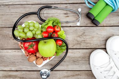 stethoscope, organic food and sport equipment clipart