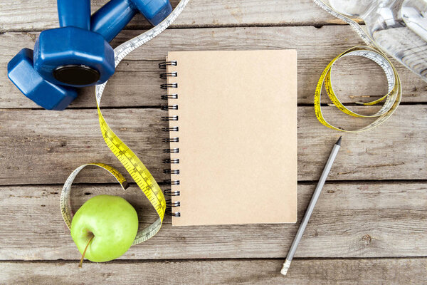 notebook, apple and sport equipment