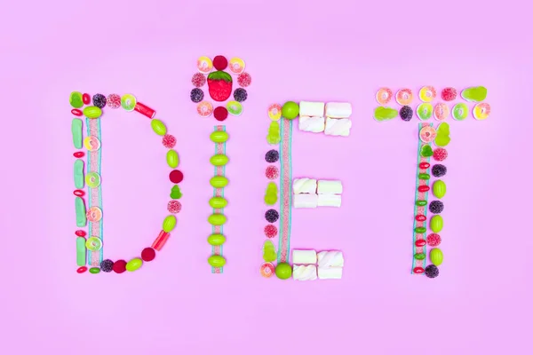 Diet word made of sweets — Free Stock Photo