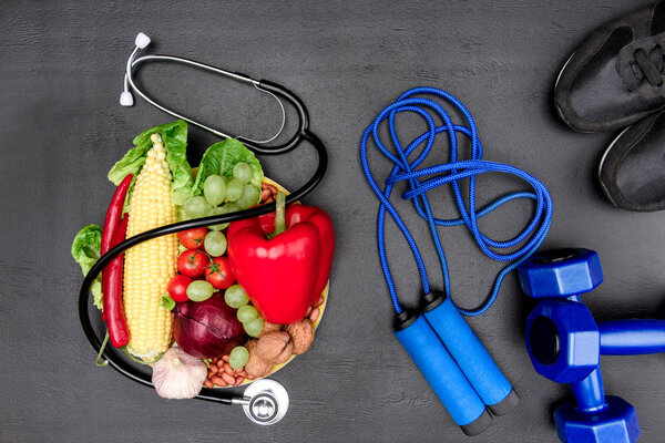 stethoscope, organic food and sport equipment