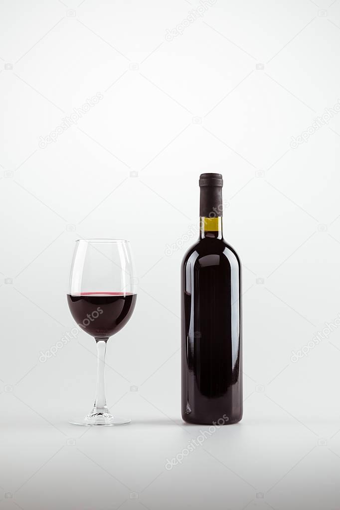 red wine in glass and bottle 