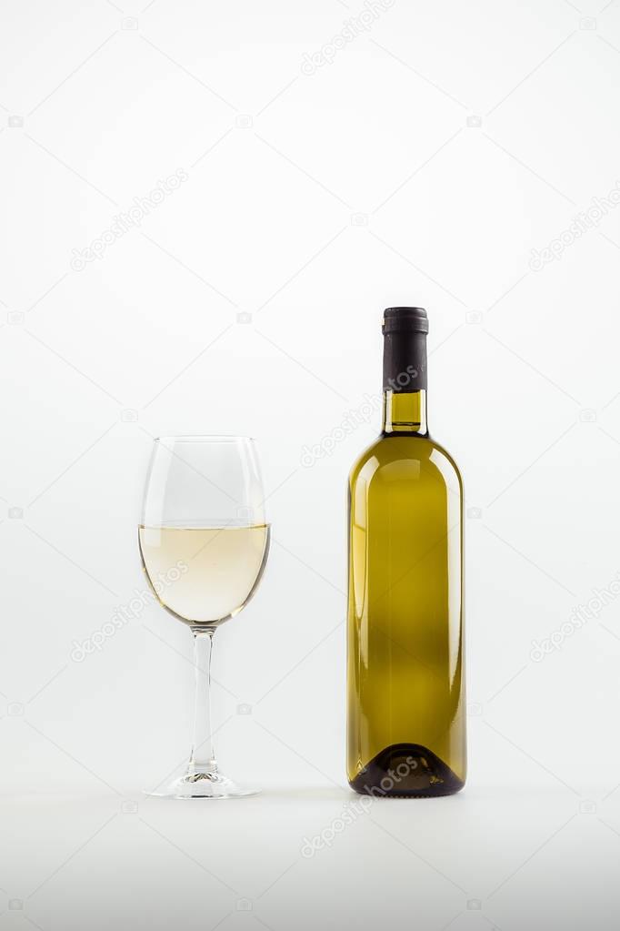 white wine in glass and bottle 
