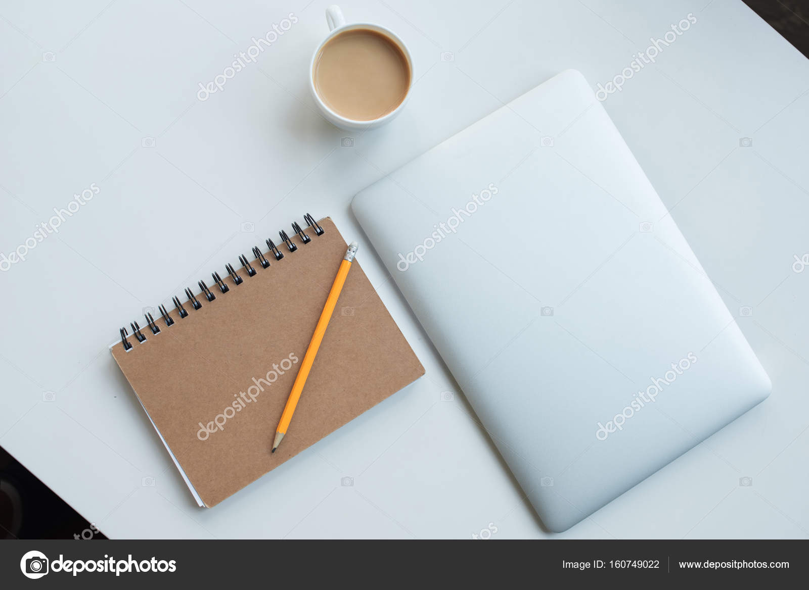 Laptop, notepad and cup of coffee — Stock Photo © AntonMatyukha 160749022