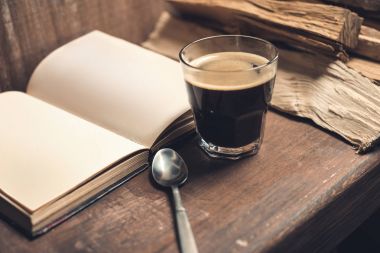 Glass of coffee, old book clipart