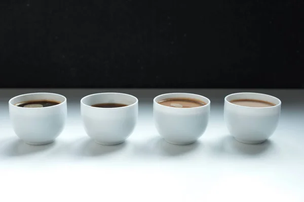 Different kinds of coffee in row — Stock Photo, Image