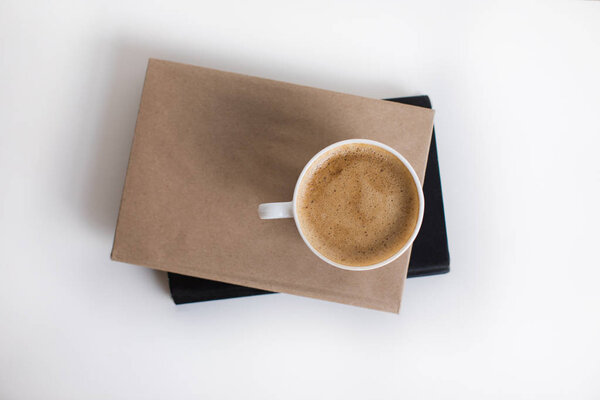 cup of coffee on books