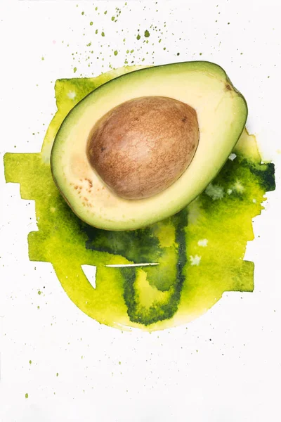 Avocado with watercolor stains — Stock Photo, Image