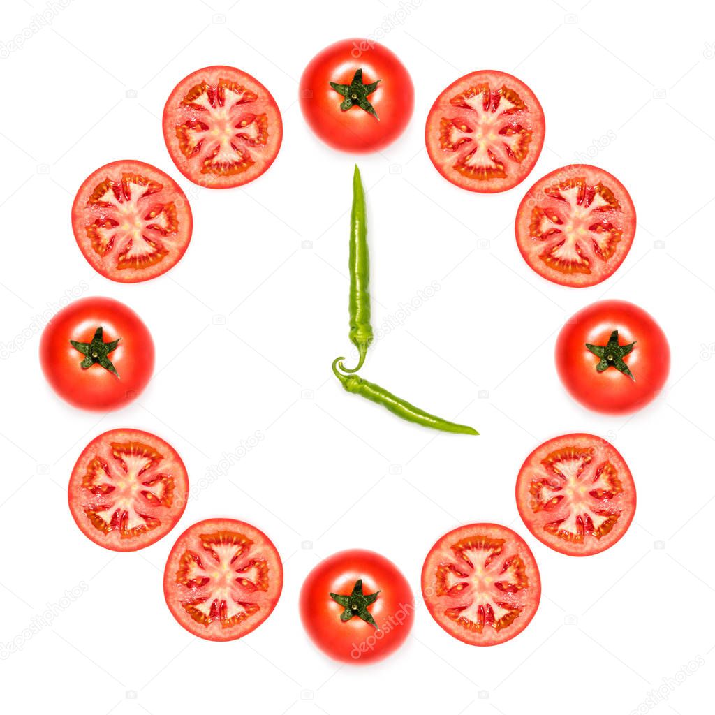 clock made of tomatoes and peppers