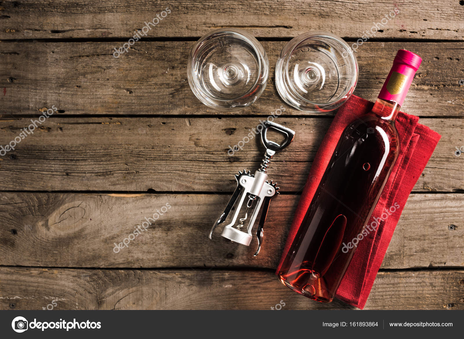 Bottle of pink wine and wineglasses Stock Photo by ©AntonMatyukha 161893864
