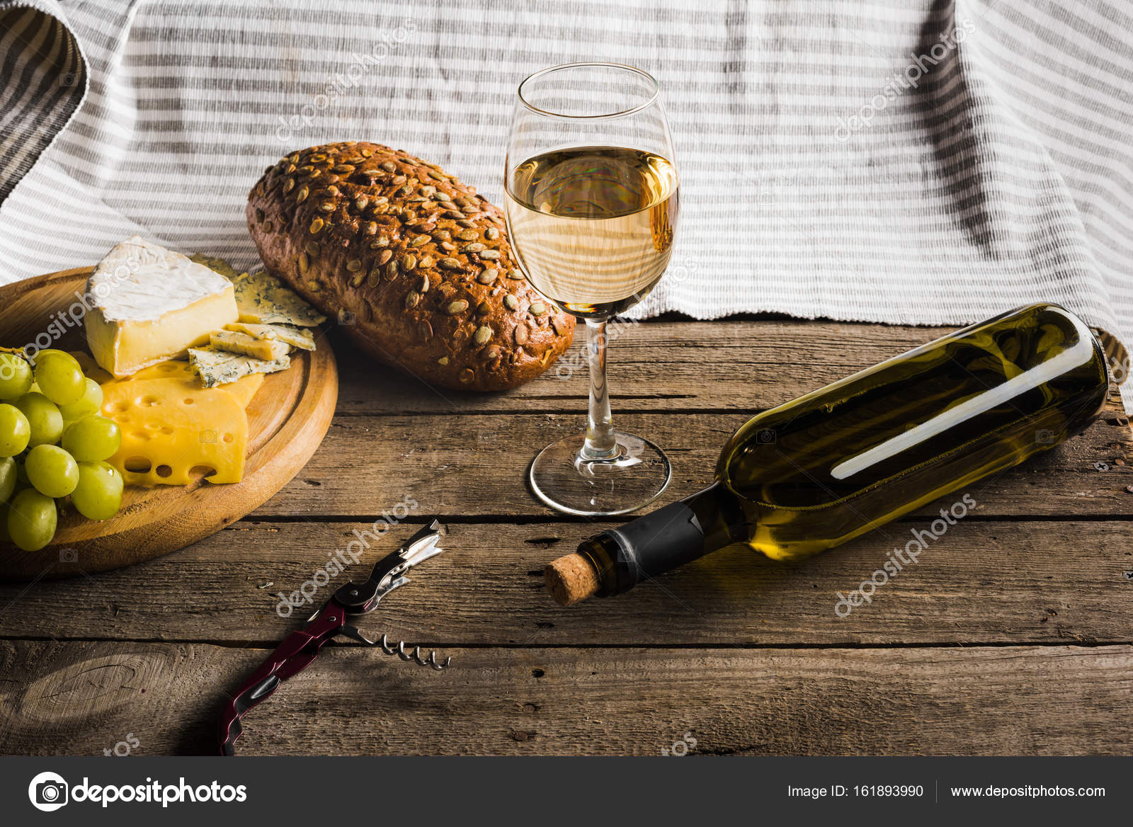 White wine, bread, and cheese — Stock Photo © AntonMatyukha 161893990