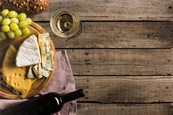 white wine, bread, and cheese   