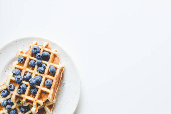 tasty waffles with blueberries