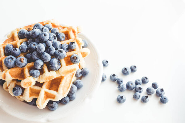 tasty waffles with blueberries