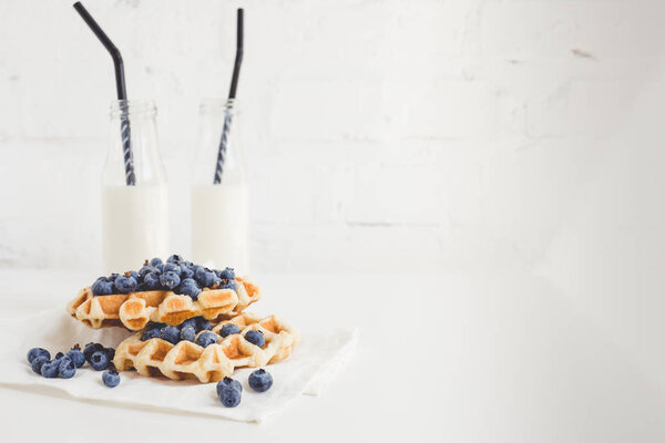 waffles with blueberries and milk