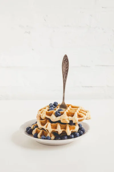 Waffles pierced with fork — Free Stock Photo