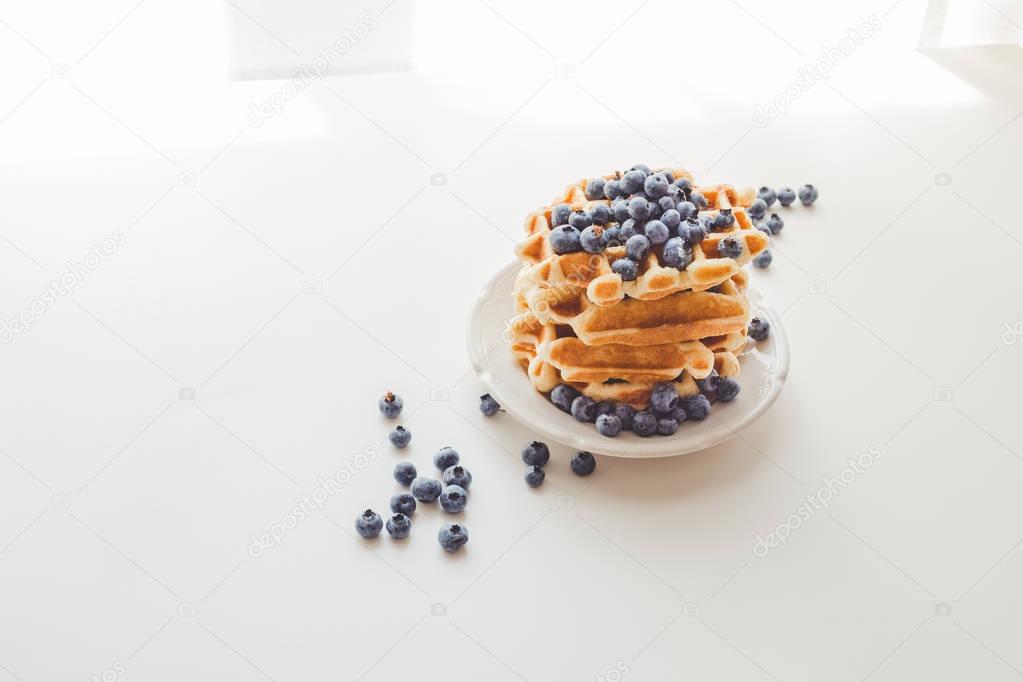 tasty waffles with blueberries