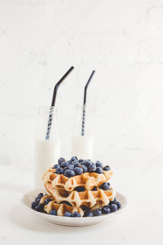 waffles with blueberries and milk