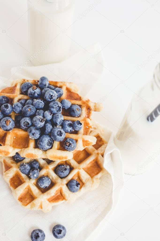 waffles with blueberries and milk