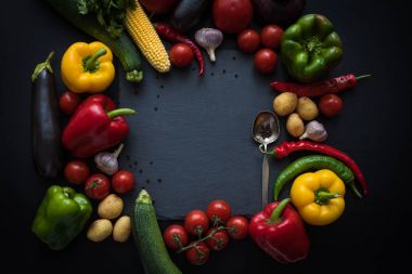 ripe vegetables and slate board clipart