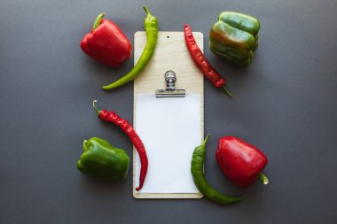 peppers and blank paper sheet clipart
