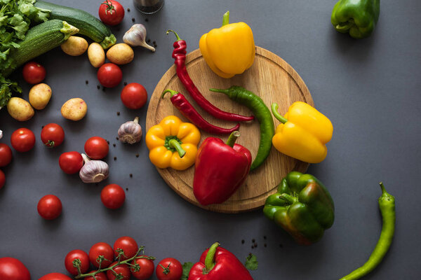 fresh vegetables and cutting board