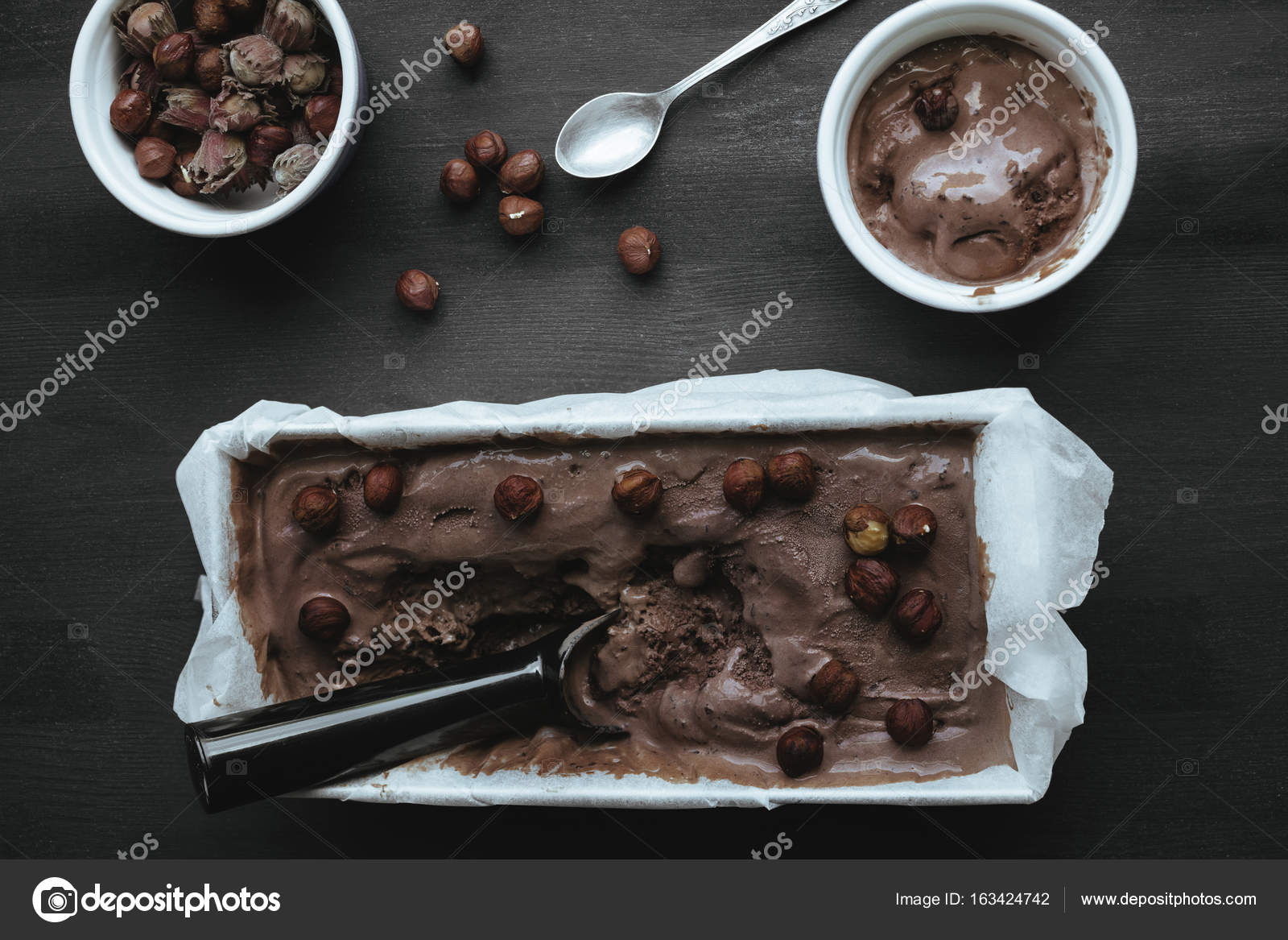 Chocolate ice cream with hazelnuts — Stock Photo © AntonMatyukha 163424742