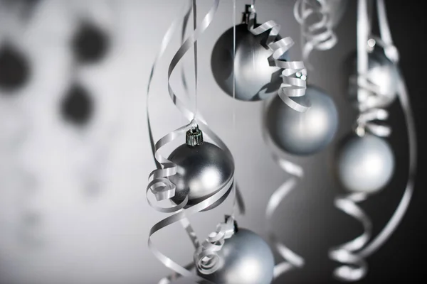 Christmas balls on ribbons — Stock Photo, Image