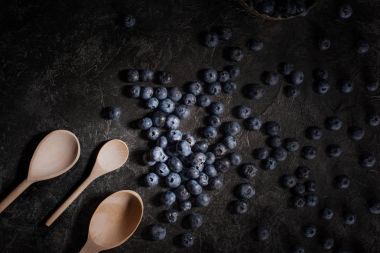 blueberries and wooden spoons   clipart