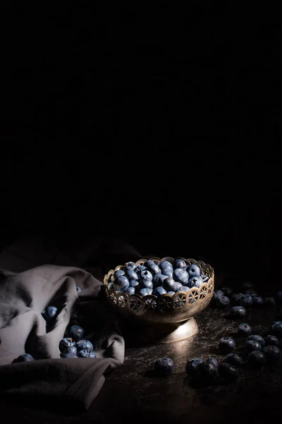 Blueberries in vintage bowl — Stock Photo, Image