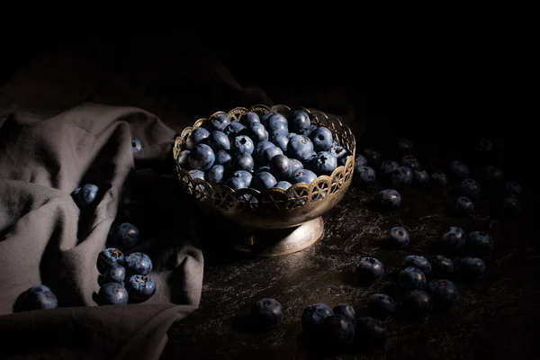 Blueberries in vintage bowl — Stock Photo, Image