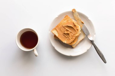 toasts with peanut butter and tea clipart