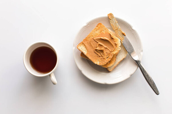 toasts with peanut butter and tea