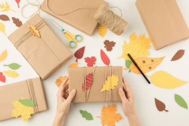 woman handcrafting autumn gifts clipart