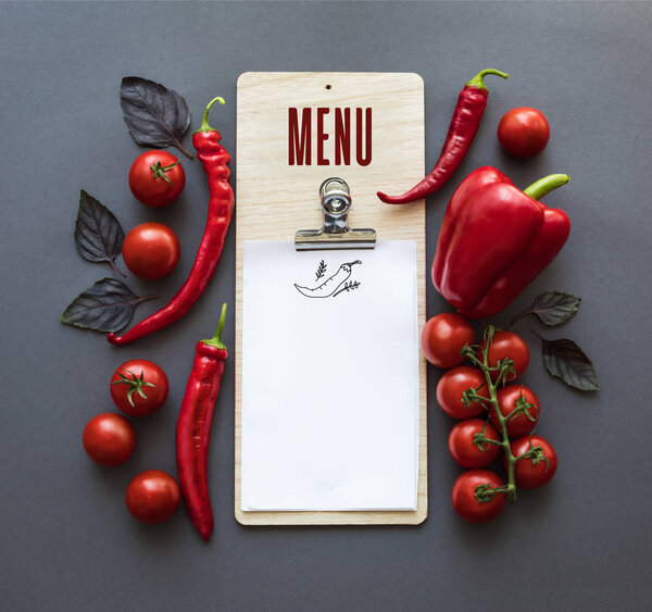 peppers and blank paper sheet