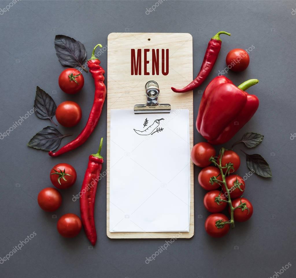 peppers and blank paper sheet