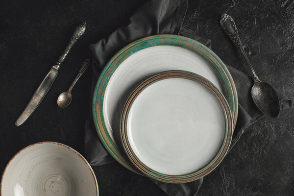 ceramic plates and silverware