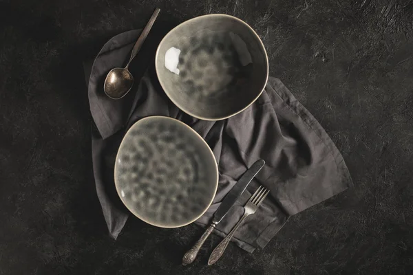 Ceramic plates and silverware — Stock Image Ceramic plates and silverware Stock Image