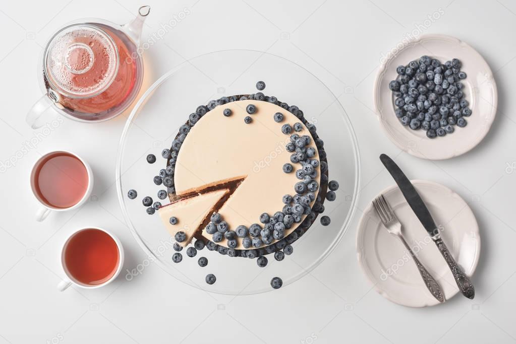 sliced cheesecake with blueberries