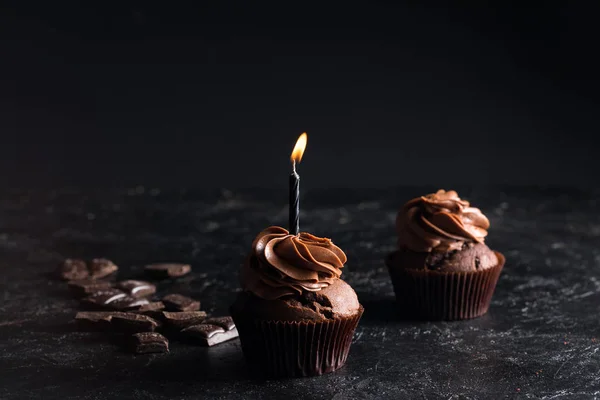 Chocolate cupcake with candle — Stock Photo, Image