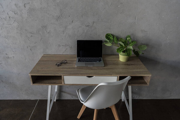 workplace with laptop computer