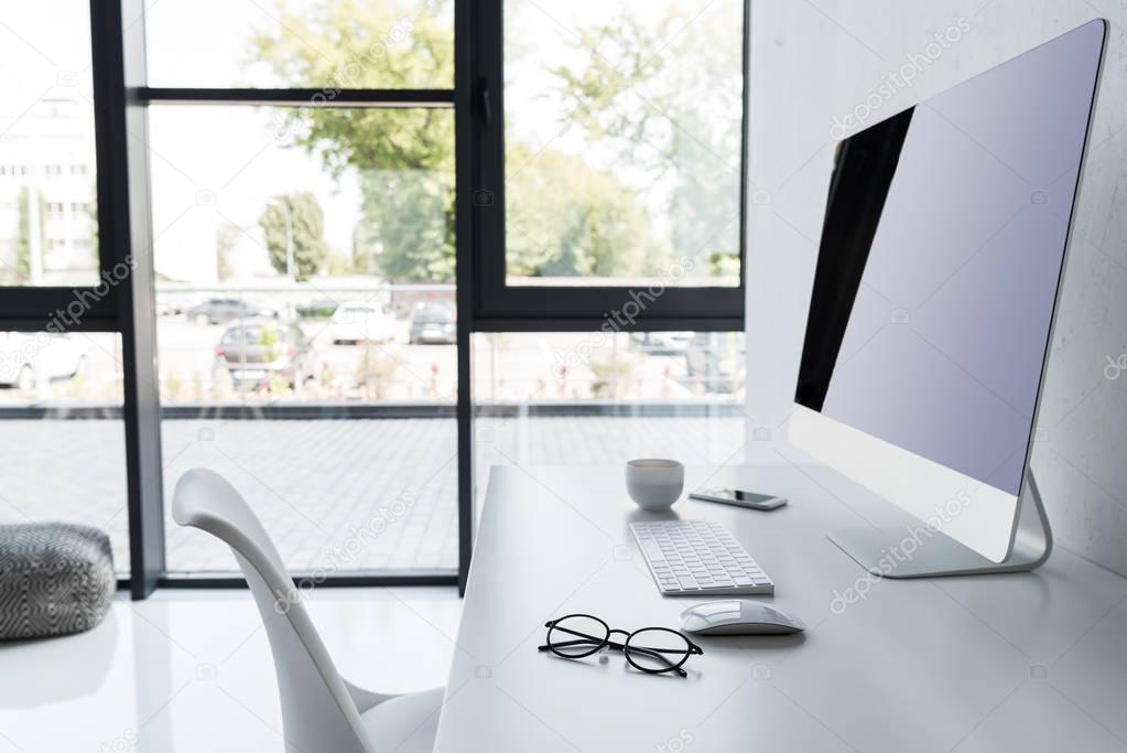 workplace with computer in modern office