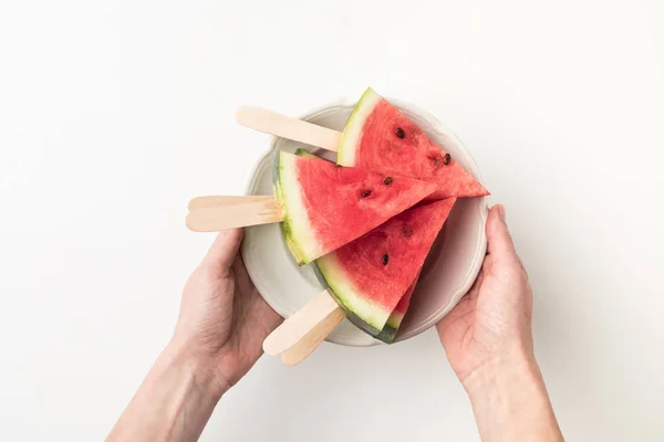 Watermelon slices on sticks — Stock Photo, Image