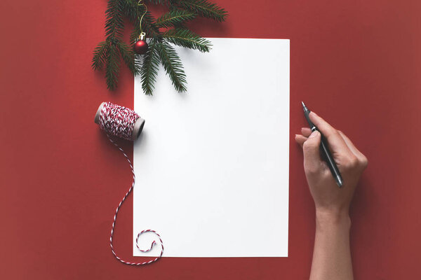 person writing christmas letter