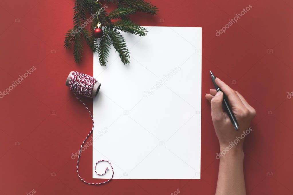 person writing christmas letter