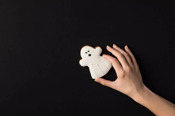 Hand with halloween cookie — Stock Photo, Image
