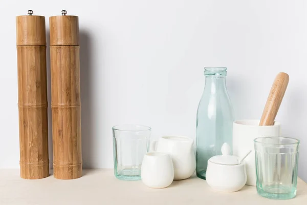 Empty glass and ceramic utensils — Stock Photo, Image