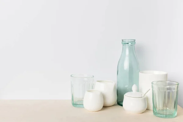 Empty glass and ceramic utensils — Stock Photo, Image