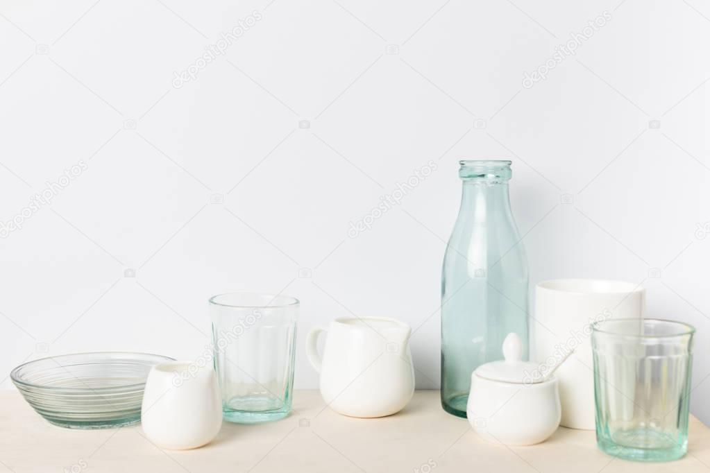 empty glass and ceramic utensils