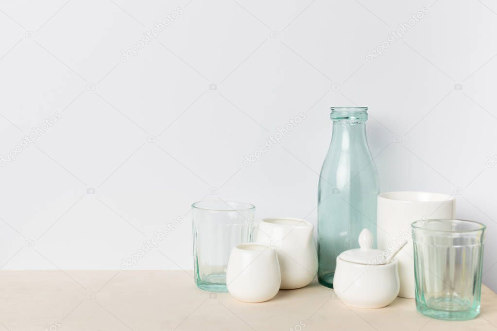 empty glass and ceramic utensils