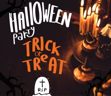 Cadılar Bayramı çörekler ve yanan mumlar  